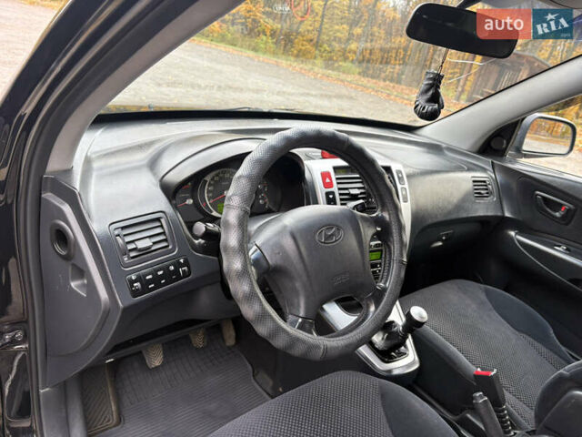 Хендай Туксон 2006 у Тернополі на Automoto.ua Чорний Хендай Туксон, об'ємом двигуна 1.99 л та пробігом 240 тис. км за 7600 $, фото 23 на Automoto.ua