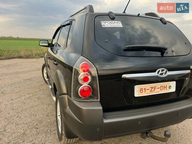 Черный Хендай Туксон, объемом двигателя 2 л и пробегом 168 тыс. км за 8000 $, фото 8 на Automoto.ua
