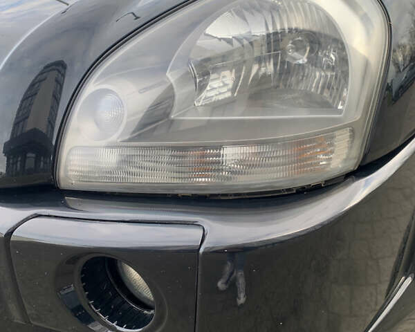 Черный Хендай Туксон, объемом двигателя 1.99 л и пробегом 290 тыс. км за 7700 $, фото 27 на Automoto.ua