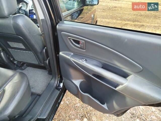 Чорний Хендай Туксон, об'ємом двигуна 1.98 л та пробігом 195 тис. км за 8200 $, фото 3 на Automoto.ua