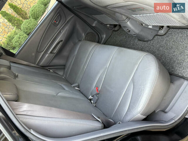 Чорний Хендай Туксон, об'ємом двигуна 1.98 л та пробігом 212 тис. км за 8200 $, фото 66 на Automoto.ua