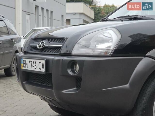 Чорний Хендай Туксон, об'ємом двигуна 1.98 л та пробігом 123 тис. км за 7950 $, фото 18 на Automoto.ua