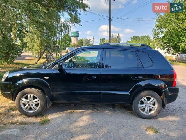 Чорний Хендай Туксон, об'ємом двигуна 1.98 л та пробігом 180 тис. км за 7600 $, фото 3 на Automoto.ua