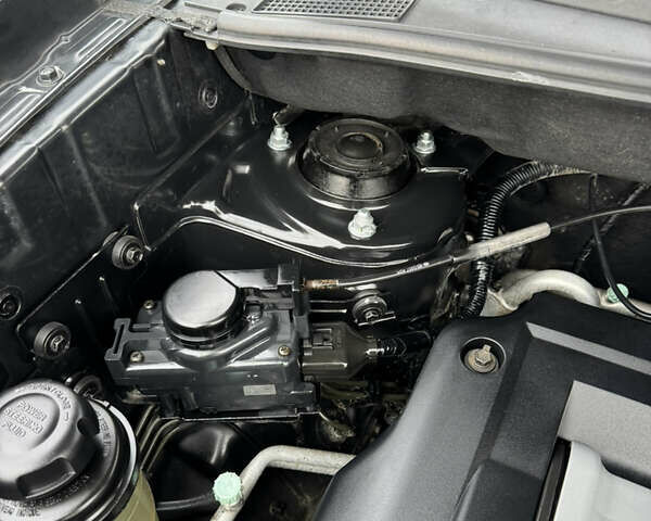 Черный Хендай Туксон, объемом двигателя 2 л и пробегом 201 тыс. км за 7750 $, фото 29 на Automoto.ua