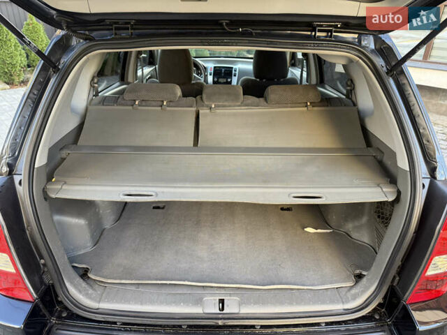 Черный Хендай Туксон, объемом двигателя 2 л и пробегом 249 тыс. км за 7450 $, фото 26 на Automoto.ua