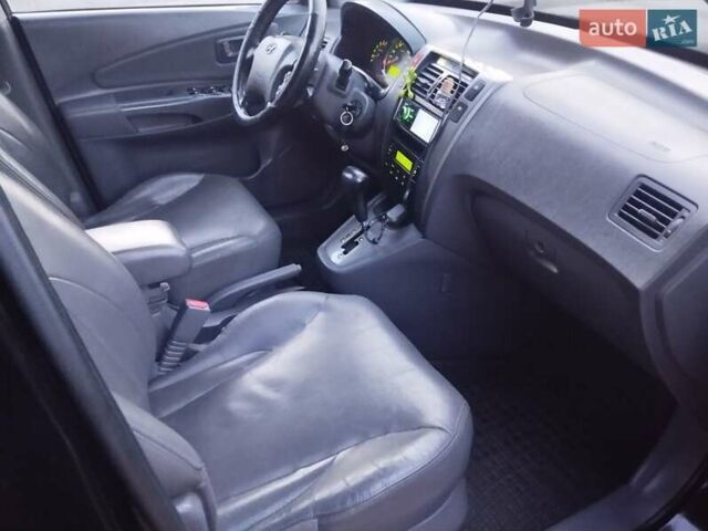 Чорний Хендай Туксон, об'ємом двигуна 1.99 л та пробігом 239 тис. км за 6990 $, фото 18 на Automoto.ua