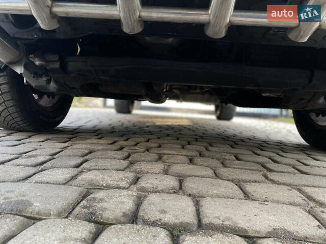 Чорний Хендай Туксон, об'ємом двигуна 1.98 л та пробігом 233 тис. км за 7650 $, фото 48 на Automoto.ua