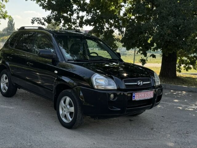 Черный Хендай Туксон, объемом двигателя 2 л и пробегом 266 тыс. км за 7700 $, фото 1 на Automoto.ua