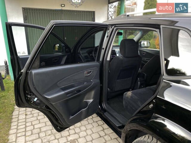 Чорний Хендай Туксон, об'ємом двигуна 1.98 л та пробігом 233 тис. км за 7650 $, фото 33 на Automoto.ua