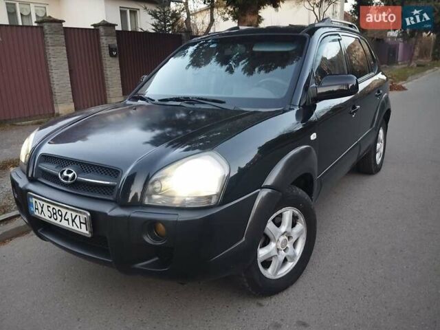Чорний Хендай Туксон, об'ємом двигуна 1.99 л та пробігом 239 тис. км за 6990 $, фото 2 на Automoto.ua