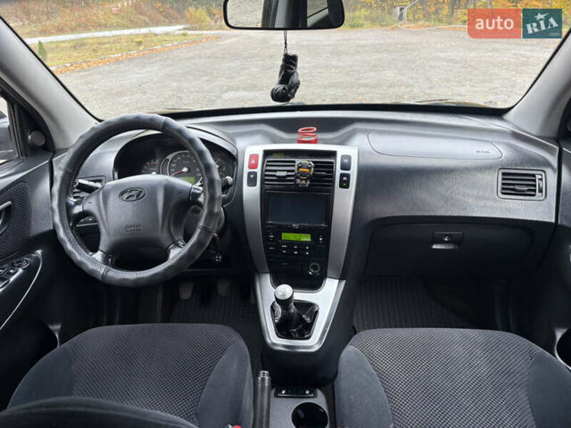 Хендай Туксон 2006 у Тернополі на Automoto.ua Чорний Хендай Туксон, об'ємом двигуна 1.99 л та пробігом 240 тис. км за 7600 $, фото 35 на Automoto.ua