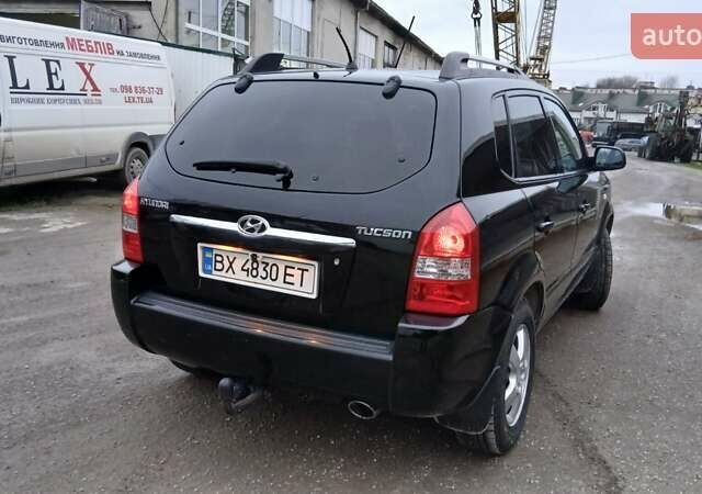 Чорний Хендай Туксон, об'ємом двигуна 1.98 л та пробігом 320 тис. км за 6500 $, фото 5 на Automoto.ua