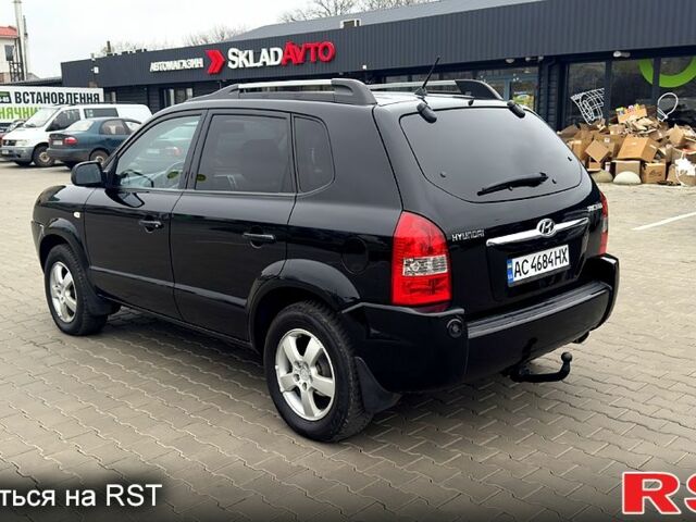 Черный Хендай Туксон, объемом двигателя 2 л и пробегом 200 тыс. км за 7800 $, фото 4 на Automoto.ua