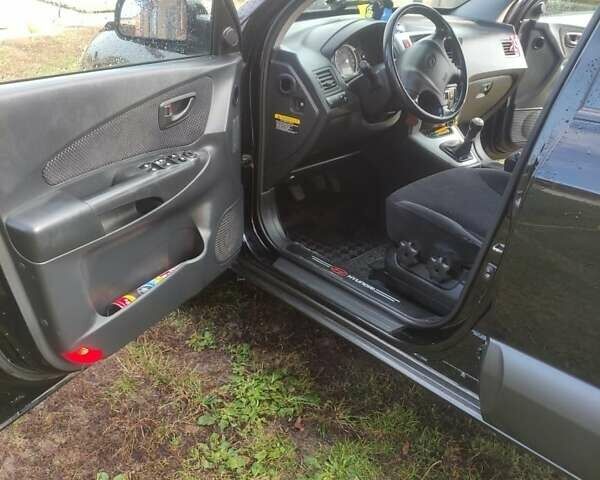 Хендай Туксон 2006 в Заречном на Automoto.ua Черный Хендай Туксон, объемом двигателя 2 л и пробегом 179 тыс. км за 7200 $, фото 12 на Automoto.ua