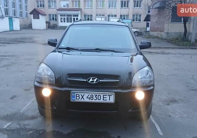 Черный Хендай Туксон, объемом двигателя 1.98 л и пробегом 320 тыс. км за 6300 $, фото 15 на Automoto.ua