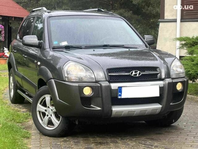 Черный Хендай Туксон, объемом двигателя 2.2 л и пробегом 230 тыс. км за 2300 $, фото 4 на Automoto.ua