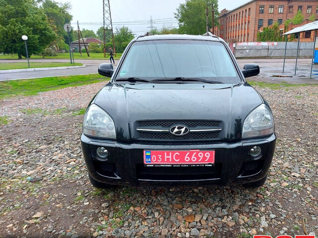 Черный Хендай Туксон, объемом двигателя 2 л и пробегом 130 тыс. км за 7200 $, фото 1 на Automoto.ua