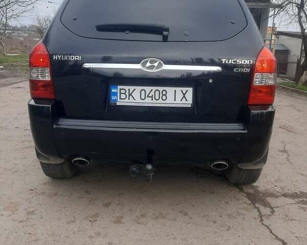Чорний Хендай Туксон, об'ємом двигуна 1.99 л та пробігом 298 тис. км за 7750 $, фото 5 на Automoto.ua