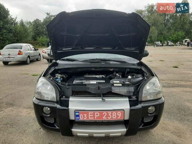 Черный Хендай Туксон, объемом двигателя 2 л и пробегом 216 тыс. км за 7600 $, фото 15 на Automoto.ua