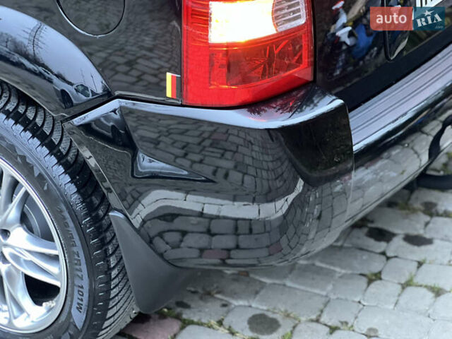 Чорний Хендай Туксон, об'ємом двигуна 1.98 л та пробігом 170 тис. км за 6999 $, фото 15 на Automoto.ua