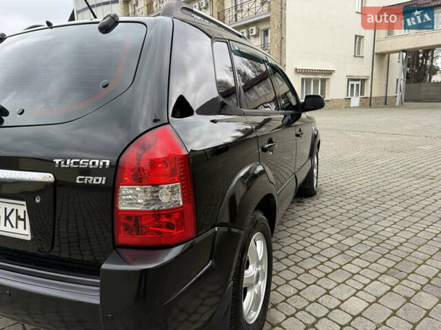 Черный Хендай Туксон, объемом двигателя 1.98 л и пробегом 250 тыс. км за 7150 $, фото 8 на Automoto.ua