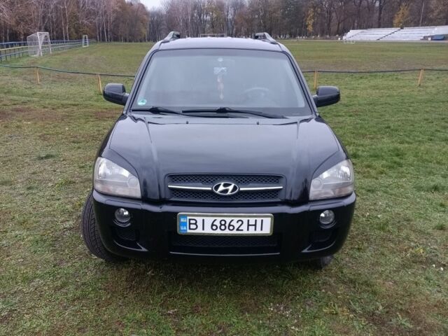 Чорний Хендай Туксон, об'ємом двигуна 2 л та пробігом 220 тис. км за 8300 $, фото 1 на Automoto.ua