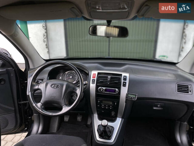 Чорний Хендай Туксон, об'ємом двигуна 1.98 л та пробігом 233 тис. км за 7650 $, фото 46 на Automoto.ua