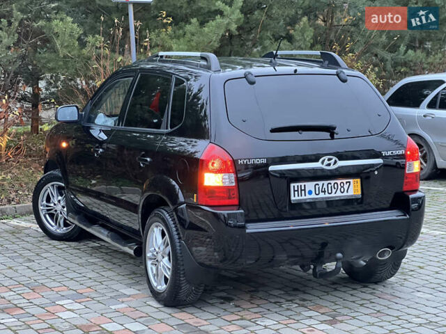 Чорний Хендай Туксон, об'ємом двигуна 1.98 л та пробігом 170 тис. км за 6999 $, фото 42 на Automoto.ua