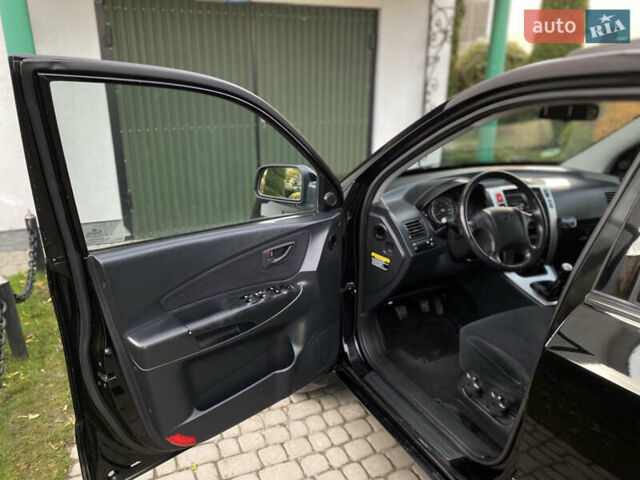 Чорний Хендай Туксон, об'ємом двигуна 1.98 л та пробігом 233 тис. км за 7650 $, фото 28 на Automoto.ua