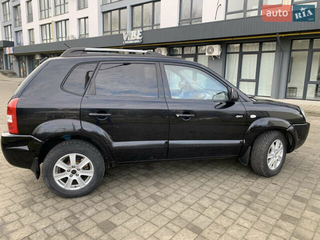 Черный Хендай Туксон, объемом двигателя 1.99 л и пробегом 290 тыс. км за 7700 $, фото 20 на Automoto.ua