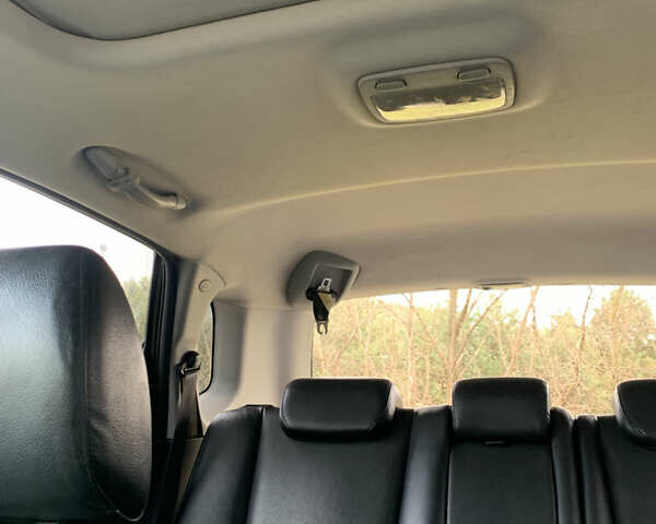 Черный Хендай Туксон, объемом двигателя 1.99 л и пробегом 290 тыс. км за 7700 $, фото 24 на Automoto.ua