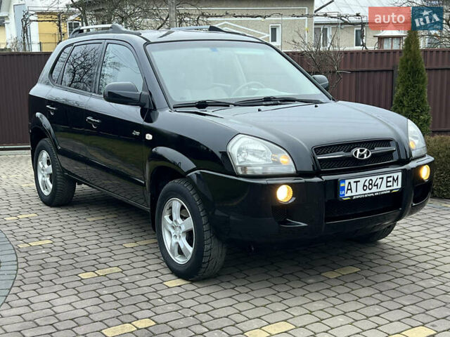 Чорний Хендай Туксон, об'ємом двигуна 1.98 л та пробігом 185 тис. км за 6850 $, фото 6 на Automoto.ua
