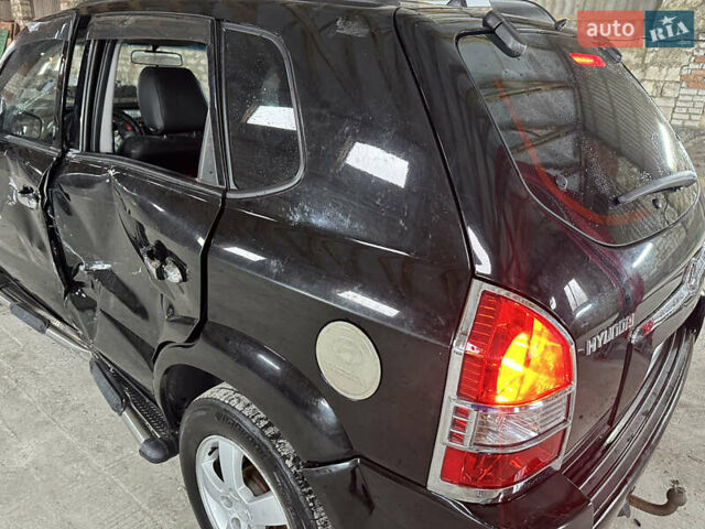 Чорний Хендай Туксон, об'ємом двигуна 2 л та пробігом 252 тис. км за 3000 $, фото 41 на Automoto.ua