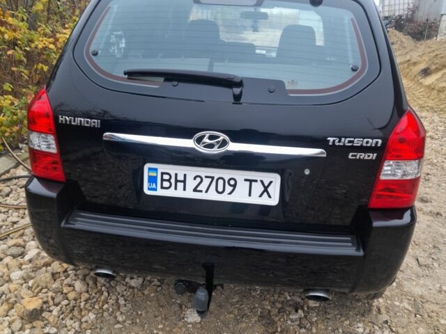 Черный Хендай Туксон, объемом двигателя 2 л и пробегом 230 тыс. км за 6800 $, фото 5 на Automoto.ua