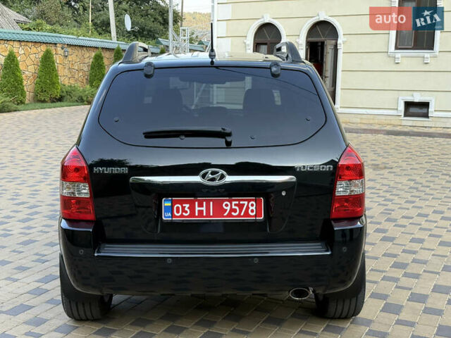 Чорний Хендай Туксон, об'ємом двигуна 1.98 л та пробігом 212 тис. км за 8200 $, фото 15 на Automoto.ua