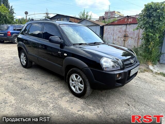 Чорний Хендай Туксон, об'ємом двигуна 2 л та пробігом 254 тис. км за 7650 $, фото 4 на Automoto.ua