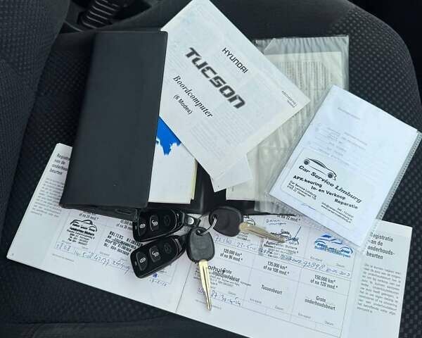 Черный Хендай Туксон, объемом двигателя 2 л и пробегом 209 тыс. км за 7600 $, фото 24 на Automoto.ua