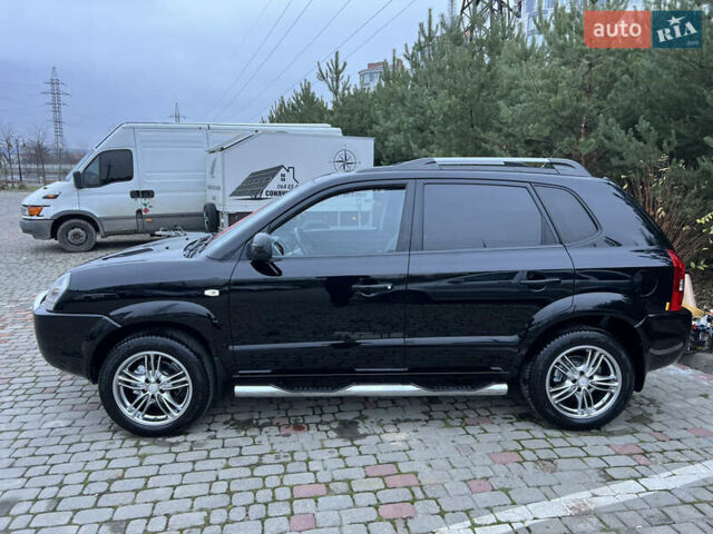 Чорний Хендай Туксон, об'ємом двигуна 1.98 л та пробігом 170 тис. км за 6999 $, фото 32 на Automoto.ua