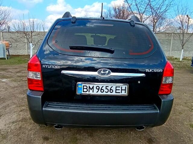 Чорний Хендай Туксон, об'ємом двигуна 2 л та пробігом 170 тис. км за 8500 $, фото 2 на Automoto.ua