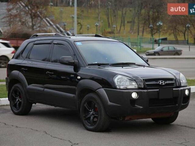 Черный Хендай Туксон, объемом двигателя 2.66 л и пробегом 217 тыс. км за 8600 $, фото 2 на Automoto.ua