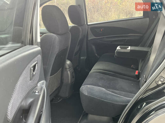 Хендай Туксон 2006 у Тернополі на Automoto.ua Чорний Хендай Туксон, об'ємом двигуна 2 л та пробігом 240 тис. км за 6699 $, фото 35 на Automoto.ua