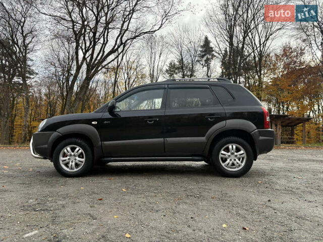 Хендай Туксон 2006 у Тернополі на Automoto.ua Чорний Хендай Туксон, об'ємом двигуна 1.99 л та пробігом 240 тис. км за 7600 $, фото 14 на Automoto.ua