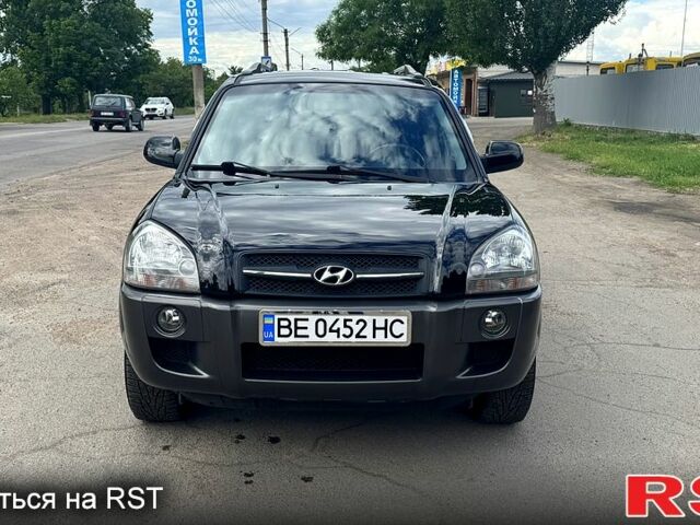 Черный Хендай Туксон, объемом двигателя 2 л и пробегом 192 тыс. км за 7700 $, фото 1 на Automoto.ua