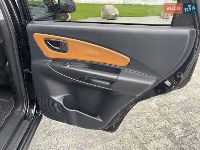 Черный Хендай Туксон, объемом двигателя 2 л и пробегом 216 тыс. км за 7500 $, фото 30 на Automoto.ua