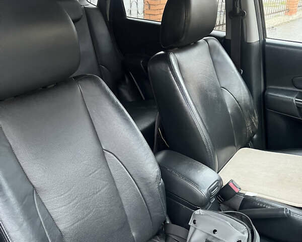 Черный Хендай Туксон, объемом двигателя 2 л и пробегом 242 тыс. км за 6999 $, фото 20 на Automoto.ua