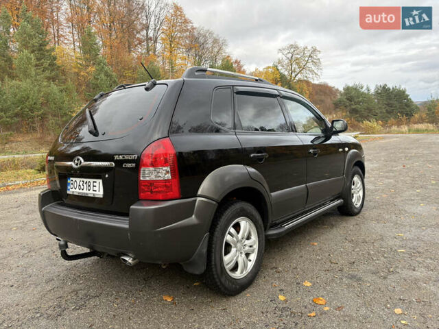 Хендай Туксон 2006 у Тернополі на Automoto.ua Чорний Хендай Туксон, об'ємом двигуна 1.99 л та пробігом 240 тис. км за 7600 $, фото 21 на Automoto.ua