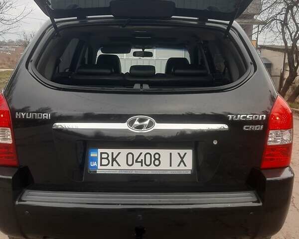 Чорний Хендай Туксон, об'ємом двигуна 1.99 л та пробігом 298 тис. км за 7750 $, фото 6 на Automoto.ua