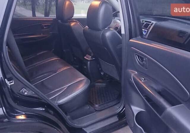 Черный Хендай Туксон, объемом двигателя 1.98 л и пробегом 320 тыс. км за 6300 $, фото 19 на Automoto.ua