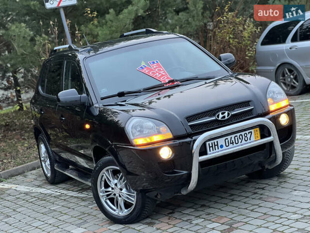 Чорний Хендай Туксон, об'ємом двигуна 1.98 л та пробігом 170 тис. км за 6999 $, фото 6 на Automoto.ua
