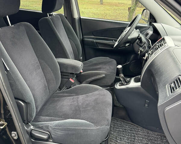 Черный Хендай Туксон, объемом двигателя 2 л и пробегом 201 тыс. км за 7750 $, фото 50 на Automoto.ua